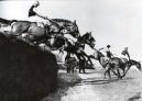 Roimond (no.2) ridden by Dick Francis, at Beecher's Brook in the Grand National, 1950.